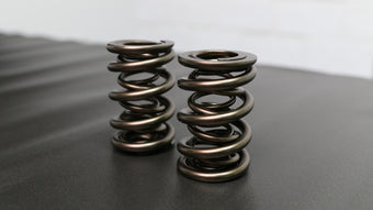 compare product Ferrea 1.650in to 1.600in .885/1.20/1.65 OD .645/.885/1.20 ID Triple Spring Valve Spring - Set of 16